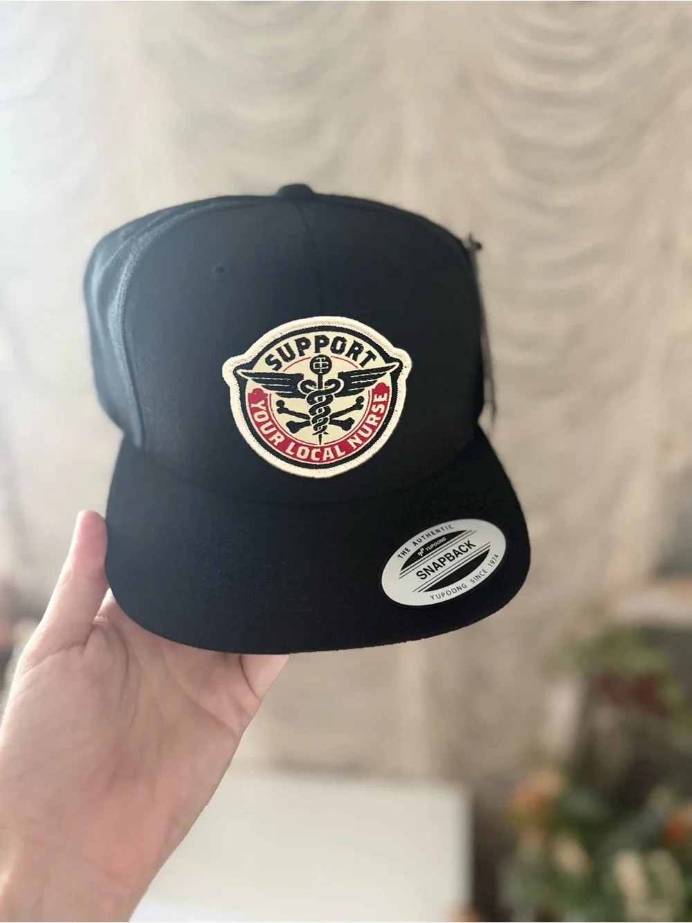 Trolls Black Snapback Hat with Red & Cream Support Patch